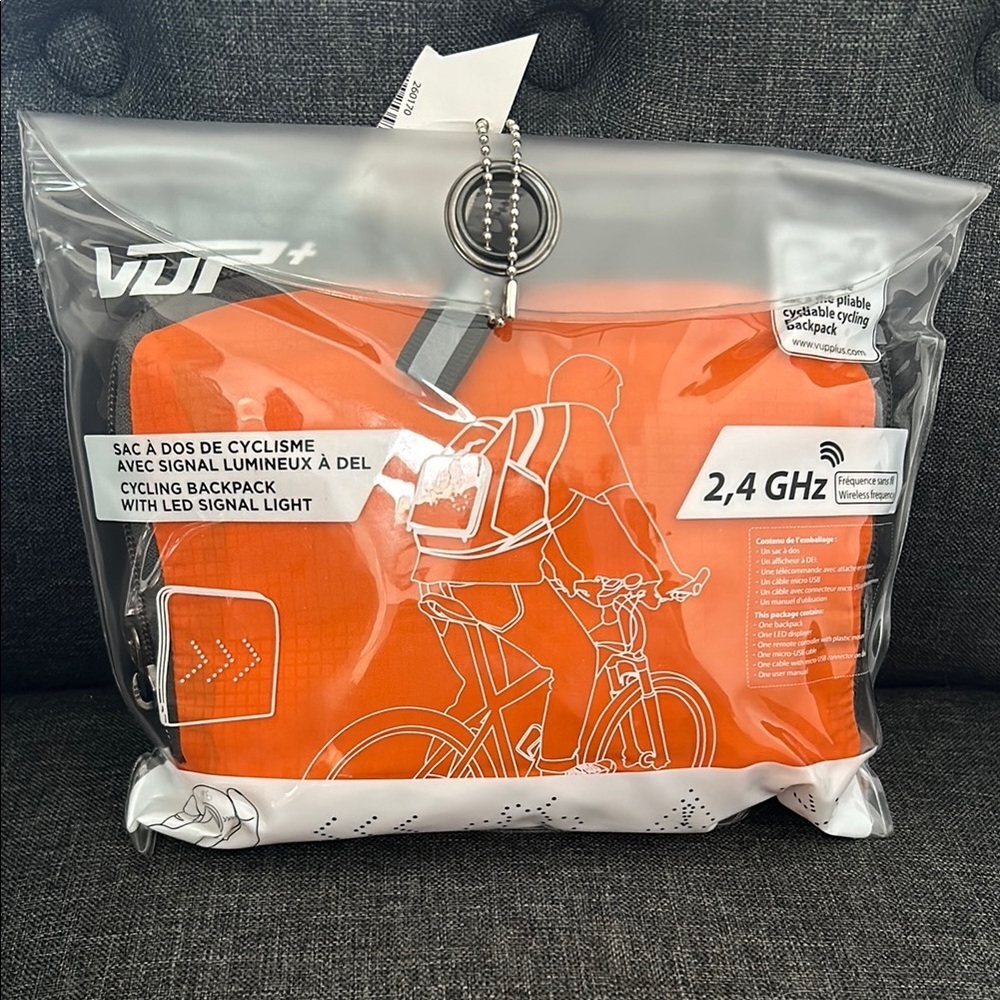 🆕 NWT Foldable Orange Cycling Backpack with LED Signal Light never opened